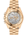 OMEGA Speedmaster Moonwatch Professional co-axial Master Chronometer Chronograph 42 mm, gold wristwatch with skeleton dial showcasing its intricate mechanical movement and chronograph features.