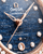 Omega Constellation co-axial Master Chronometer 29 mm watch, close-up of the blue textured dial with diamond hour markers, rose gold hands, and date window at 6 o'clock.