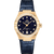 OMEGA Constellation co-axial Master Chronometer 29 mm watch, featuring a gold case with a diamond bezel, a dark starry dial with diamond hour markers, and a blue leather strap.