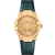 OMEGA Constellation co-axial Master Chronometer 29 mm, gold watch with diamond markers and a dark green strap.