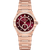 OMEGA Constellation co-axial Master Chronometer Small Seconds 34 mm watch, luxurious rose gold design with a red dial, diamond-set bezel and markers, and a sophisticated bracelet.