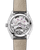 Omega De VilleTrésor co-axial Master Chronometer Power Reserve 40 mm watch, showcasing its intricate mechanical movement visible through the transparent case back, with detailed engravings and purple jewel accents.