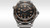 Omega Seamaster Diver 300M co-axial Master Chronometer 42 mm watch, stainless steel case and bracelet, black dial with orange accents, rotating bezel, and luminous markers.