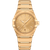 OMEGA Constellation co-axial Master Chronometer 39 mm watch, gold-tone with a round dial, Roman numeral and index hour markers, date display at 6 o'clock, and integrated gold bracelet.