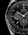 OMEGA Speedmaster Calibre 321 Chronograph 42 mm, close-up view of the black dial with sub-dials and white markers, stainless steel case, and tachymeter scale.