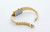 Roamer Watch, a luxurious gold-tone digital wristwatch with a rectangular face, compact design, and adjustable strap.