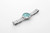 Roamer Watch, stylish men's wristwatch with a silver stainless steel band and a turquoise dial featuring date display and black hour markers.