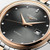 LONGINES Elegance Flagship Heritage [L4.984.3.77.7], luxury men's automatic wristwatch with a black dial, diamond hour markers, real rose gold bezel, date display, and stainless steel bracelet.