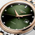 LONGINES Elegance Lyre [L4.374.3.07.7], close-up of the watch face featuring a deep green dial, diamond hour markers, and a date display at 3 o'clock
