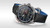 OMEGA Speedmaster X-33 Marstimer, wristwatch featuring a black dial with digital displays, a tachymeter scale, and a black and blue strap.