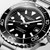 LONGINES Longines HydroConquest, a black dial watch with luminous hour markers, date display, and a rotating bezel, stainless steel bracelet, and water resistance for diving.