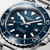 LONGINES Longines HydroConquest [L3.788.4.96.6], close-up of the blue dial with luminous markers and stainless steel bezel and bracelet.