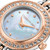 CERRUTI 1881 WATCH [CIWLG0073004], close-up of a stylish women's watch featuring a rose gold and silver band, a mother-of-pearl dial, and a bezel encrusted with crystals.