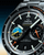 Omega Speedmaster Pilot 41 mm, close-up of the watch face showcasing chronograph subdials, tachymeter scale, and luminous hands.