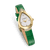 SAINT HONORE PETIT PALAIS watch, luxurious gold watch with diamond accents and a green leather strap.