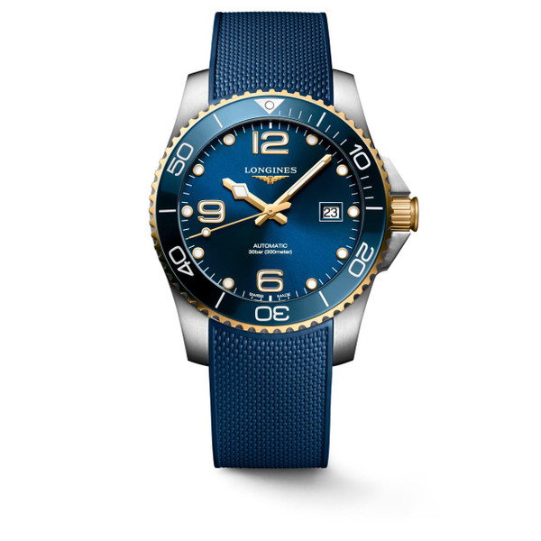 Longines HydroConquest, blue dial dive watch with stainless steel and gold accents, featuring a blue rubber strap and date display at 3 o'clock.