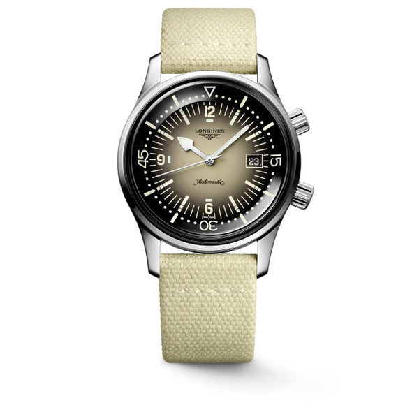 Longines Legend Diver [L3.774.4.30.2], close-up of a vintage-style diving watch with a black and beige gradient dial, beige fabric strap, silver-tone case, and chronograph pushers.