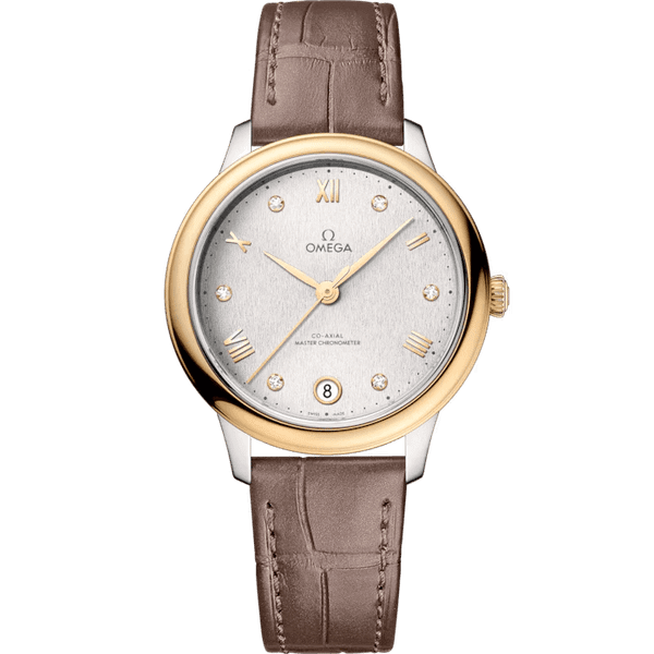 OMEGA De VillePrestige co-axial Master Chronometer 34 mm watch, silver dial with gold accents, diamond hour markers, brown leather strap.