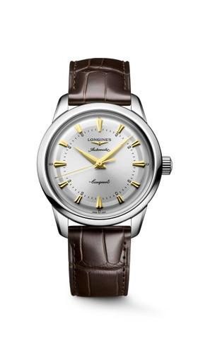 LONGINES Conquest Heritage [L1.649.4.72.0], wristwatch with silver dial, gold markers and hands, stainless steel case, and dark brown leather strap.