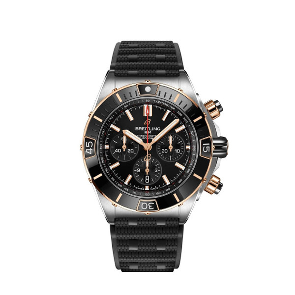 Breitling Super Chronomat B01 44 [UB0136251B1S1], luxury men's wristwatch with black dial, chronograph features, gold and black bezel, stainless steel case, and black rubber strap.