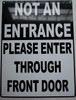 SIGN NOT AN ENTRANCE PLEASE ENTER THROUGH FRONT DOOR