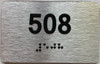 apartment number 508 sign