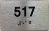 apartment number 517 sign
