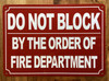 HPD DO NOT BLOCK BY ORDER OF FIRE MARSHAL SIGN