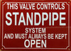 THIS VALVE CONTROLS STANDPIPE SYSTEM AND MUST ALWAYS BE KEPT OPEN COMPLIANCE SIGN