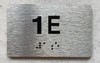 APT NUMBER 1E COMPLIANCE SIGN-UNIT NUMBER COMPLIANCE SIGN WITH RAISED LETTERS