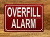 NYC OVERFILL ALARM SIGN