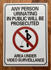 FD ANY PERSON URINATING IN PUBLIC WILL BE PROSECUTED -NO PUBLIC URINATION SIGN