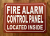 FIRE ALARM CONTROL PANEL LOCATED INSIDE COMPLIANCE SIGN