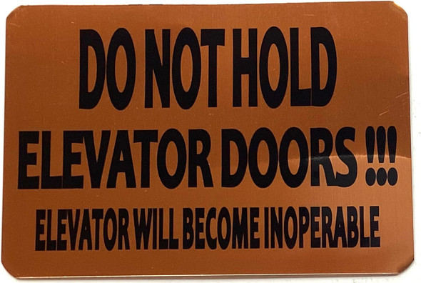 DO NOT HOLD ELEVATOR DOORS ELEVATOR WILL BECOME INOPERABLE