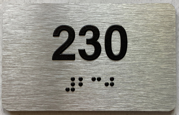 apartment number 230 sign