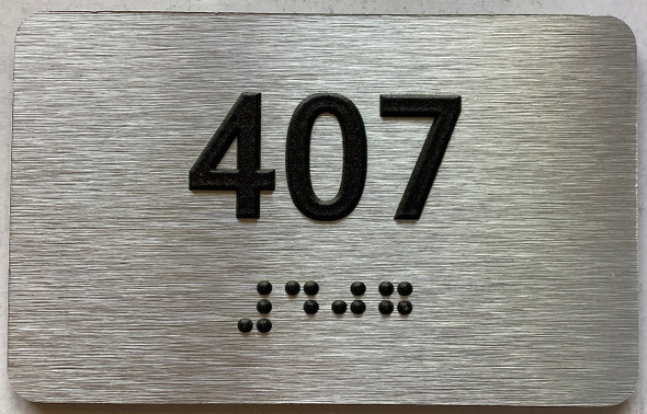 apartment number 407 sign