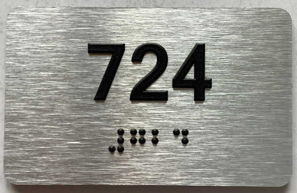 apartment number 724 sign