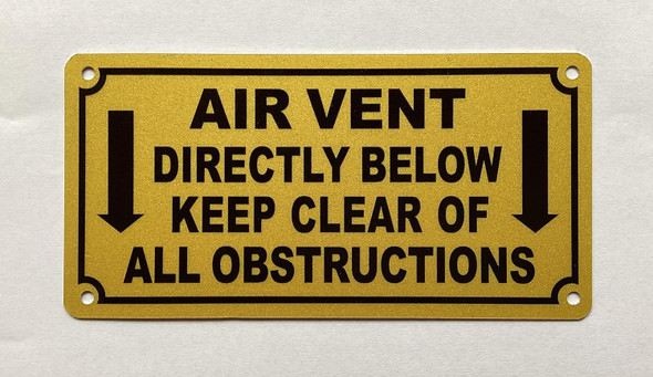NYC AIR VENT DIRECTLY BELOW KEEP CLEAR OF ALL OBSTRUCTIONS SIGN
