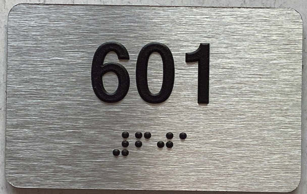 apartment number 601 sign