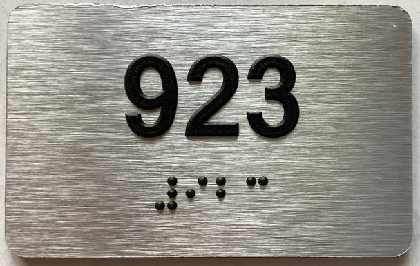 apartment number 923 sign