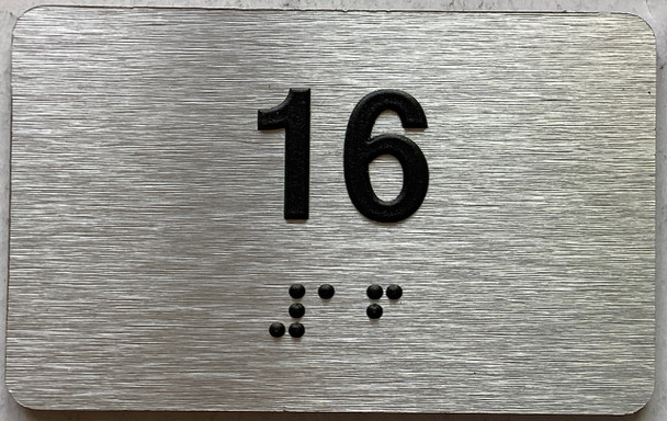 apartment number 16 sign