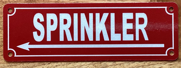 SPRINKLER LEFT ARROW SIGN