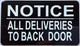 Sign NOTICE ALL DELIVERIES TO BACK DOOR  (BLACK, ALUMINIUM,DOUBLE SIDED TAPE)