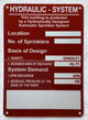 HPD HYDRAULIC SYSTEM SIGN -THIS BUILDING IS PROTECTED BY HYDRAULIC SYSTEM SIGN