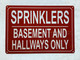 HPD SPRINKLERS IN BASEMENT AND HALLWAYS ONLY SIGN