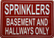 SPRINKLERS IN BASEMENT AND HALLWAYS ONLY COMPLIANCE SIGN