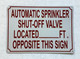 HPD AUTOMATIC SPRINKLER SHUT OFF VALVE LOCATED FEET OPPOSITE THIS SIGN SIGN