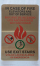 NYC IN CASE OF FIRE ELEVATORS ARE OUT OF SERVICE USE EXIT STAIRS SIGN