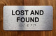 NYC LOST AND FOUND SIGN WITH RAISED LETTERS