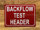 BACKFLOW TEST HEADER SAFETY SIGN